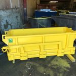 photograph of a made in Canada drop bottom box hopper custom paint colour