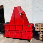 photograph of a made in Canada drop bottom box hopper with bail system